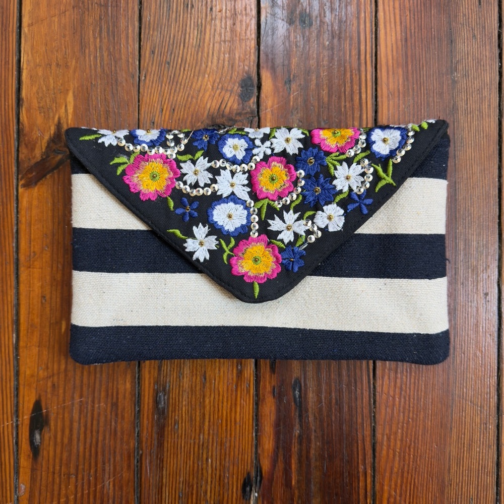 Francesca’s striped floral envelope clutch or chain crossbody bag in Black